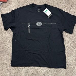 Nike Men’s Black Short Sleeve Logo Tee with Subtle Stripe